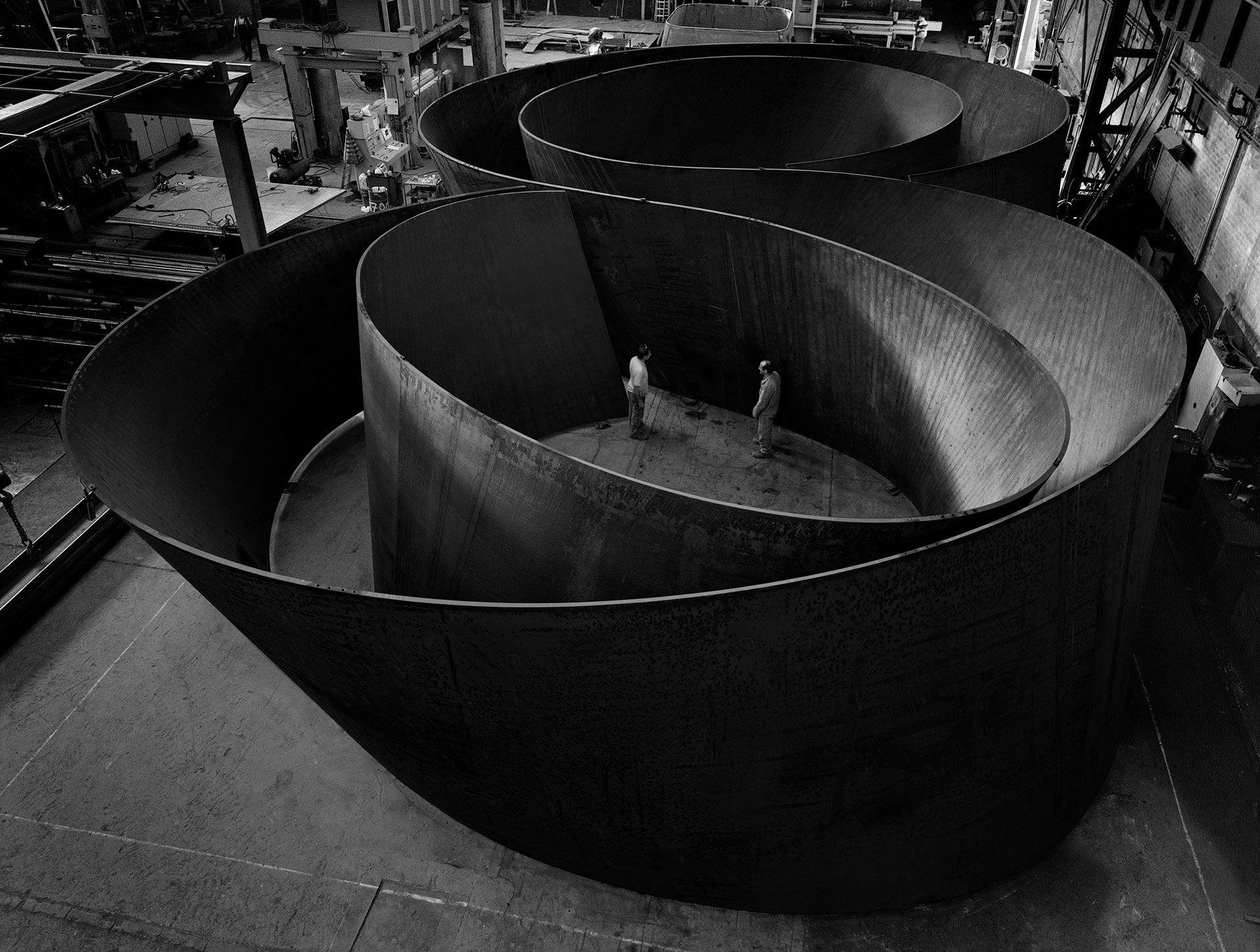 A steel sculpture by Richard Serra titled Sequence, dated 2006.